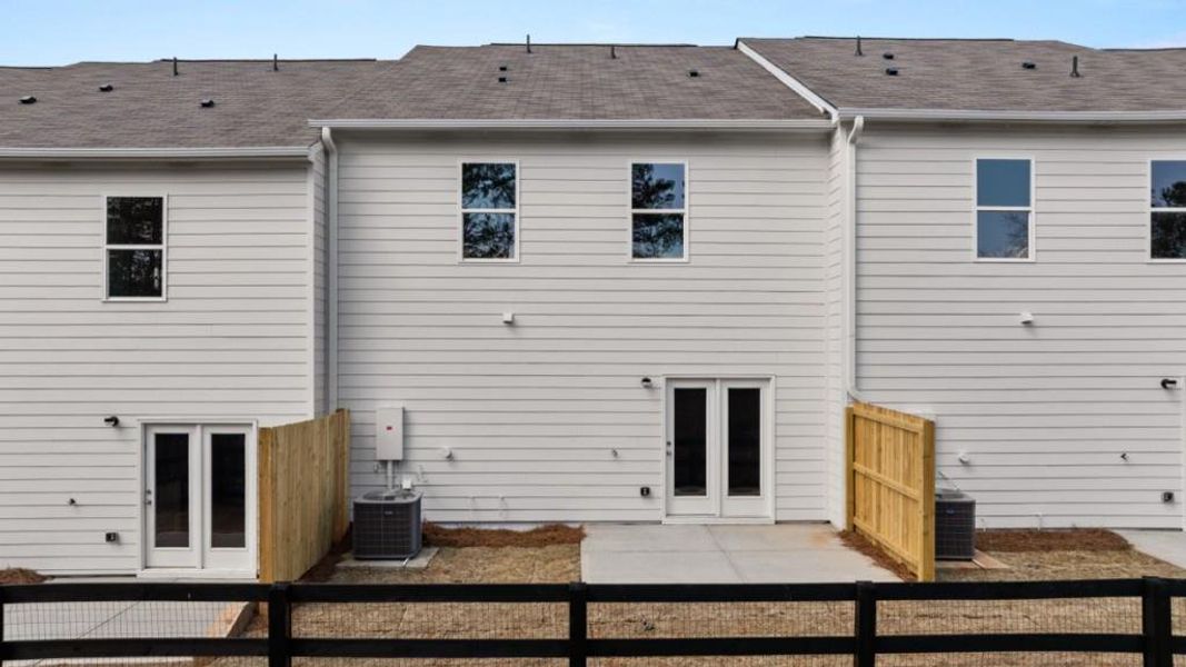 Exterior details and patio area of a home in Falcon Landing, Gainesville (Image 4).