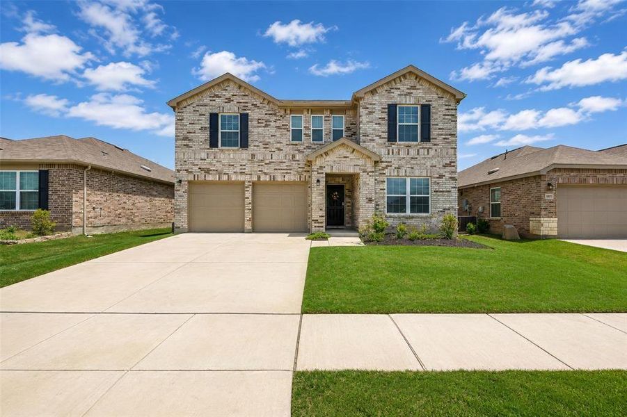 Front exterior of a new home in , Denton, TX, highlighting curb appeal (Image 27). Front exterior of a new home in , Denton, TX, highlighting curb appeal (Image 27).