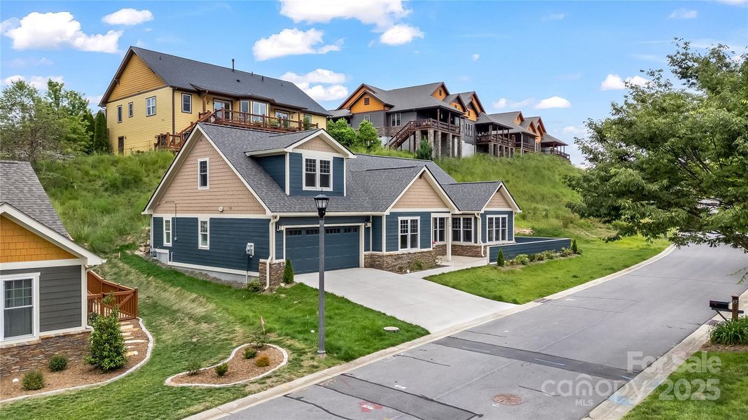 2 car garage with low maintenance living. Notice the large patio area