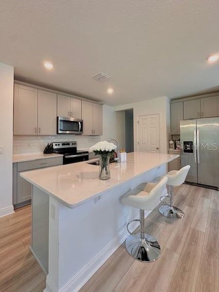 Furnished interior view inside a new home in Links Terrace, Daytona Beach (Image 7).
