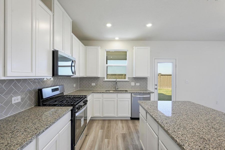 Furnished interior view inside a new home in Centerpoint Meadows, Lockhart (Image 8).