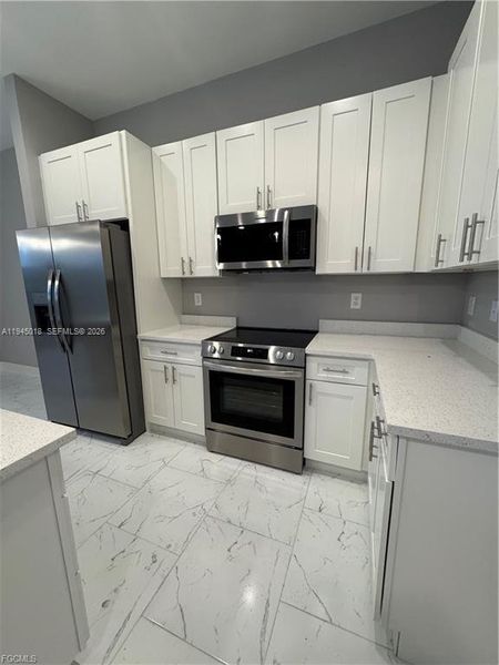 Furnished interior view inside a new home in , Lehigh Acres (Image 6).