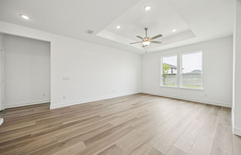 Airy gathering room showcases open concept floorplan  *Real home pictured