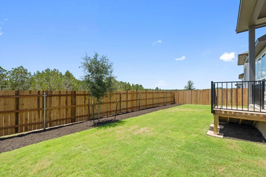 Exterior details and patio area of a home in Heritage, Dripping Springs (Image 22).