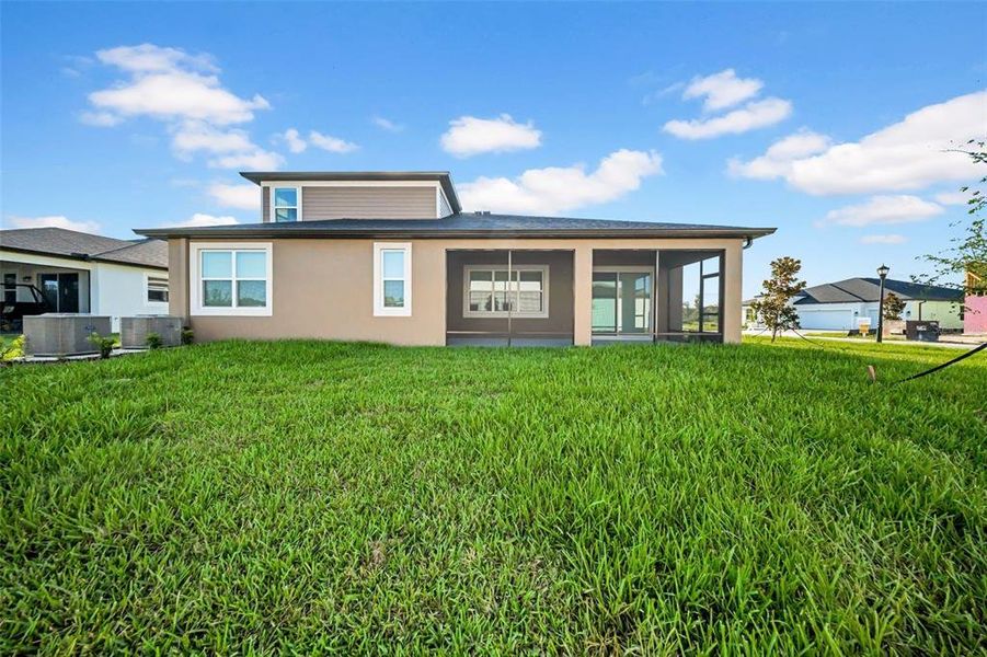 Exterior details and patio area of a home in , Wesley Chapel (Image 27).
