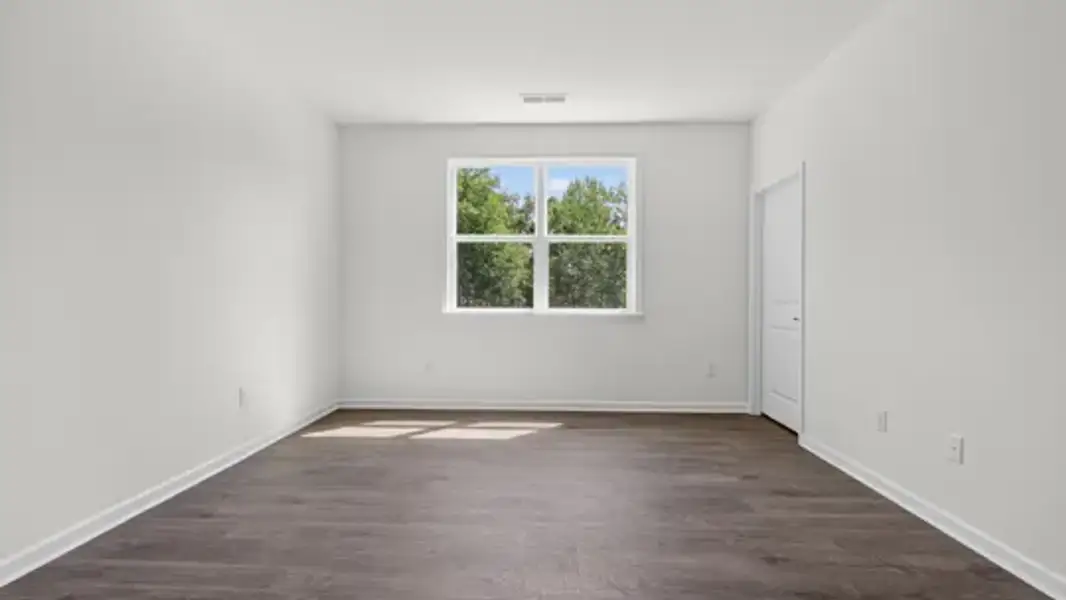 Spacious, unfurnished interior of a new home in The Villas at Galvins Ridge, Sanford (Image 19).