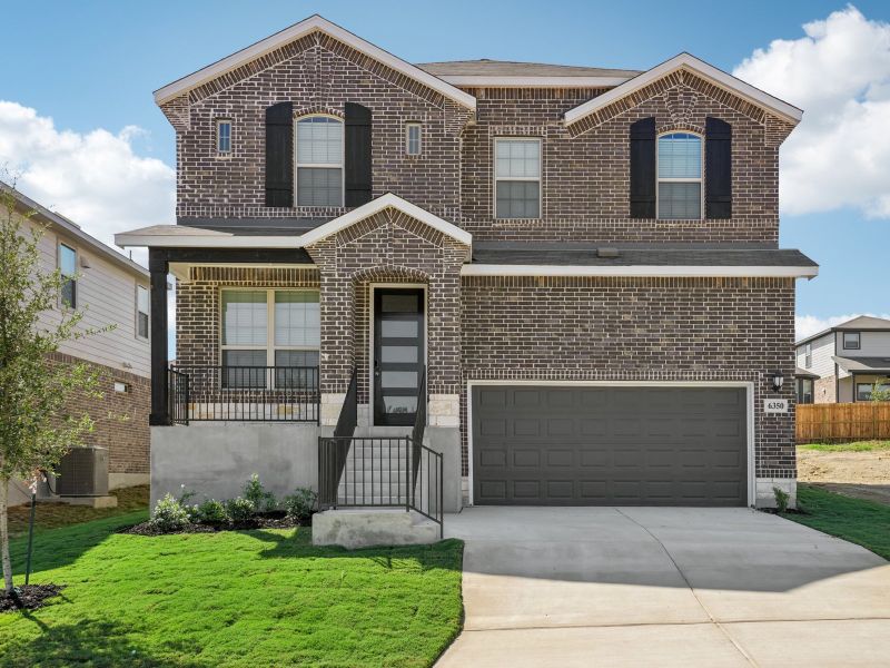 Front exterior of a new home in Comanche Ridge, San Antonio, TX, highlighting curb appeal (Image 2). Front exterior of a new home in Comanche Ridge, San Antonio, TX, highlighting curb appeal (Image 2).
