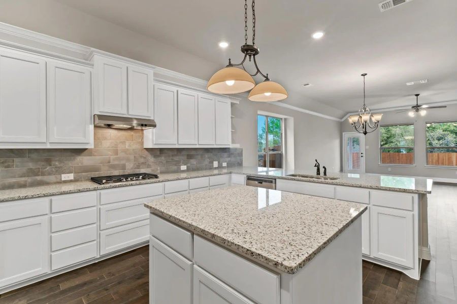 Kitchen | Concept 2533 at Abe's Landing in Granbury, TX by Landsea Homes