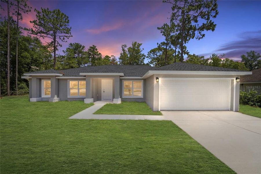 Front exterior of a new home in , Dunnellon, FL, highlighting curb appeal (Image 1).