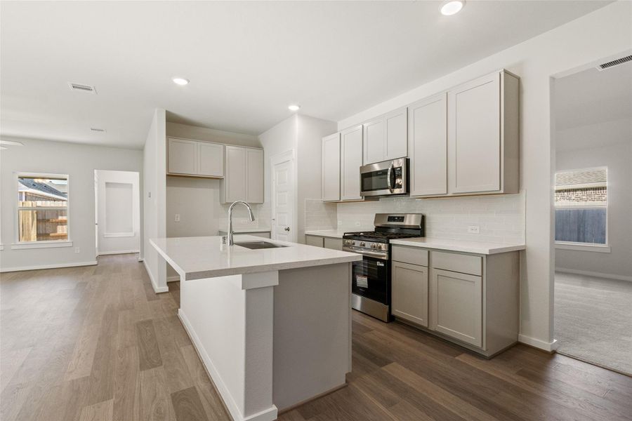 Furnished interior view inside a new home in Sunterra, Katy (Image 7).