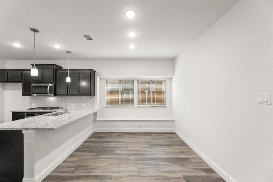 Furnished interior view inside a new home in The Reserve at Spiritas Ranch, Little Elm (Image 7).