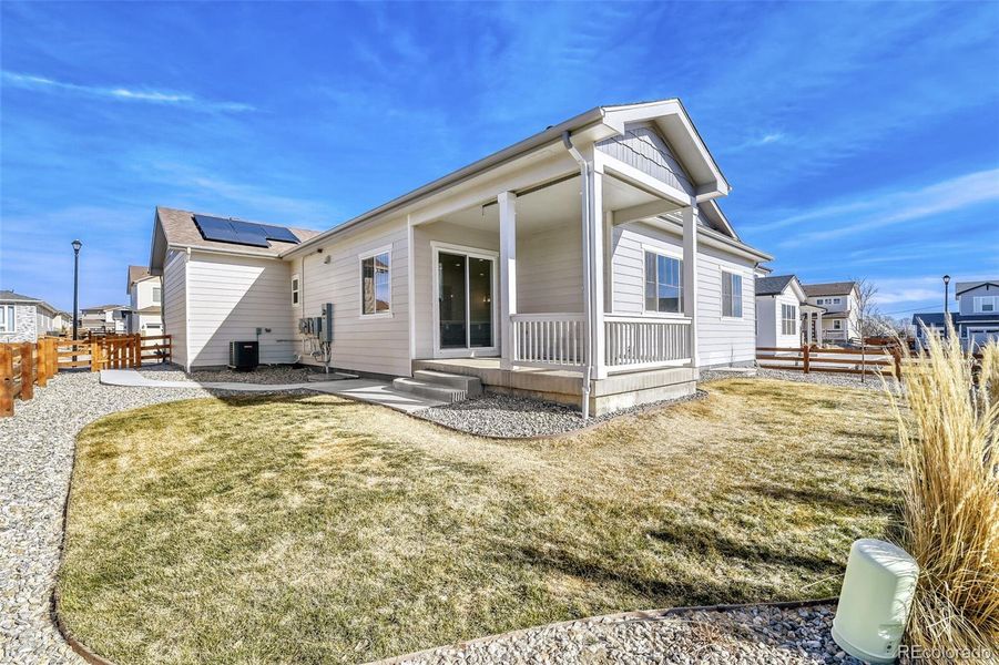 Exterior details and patio area of a home in Creekside Village, Thornton (Image 24).