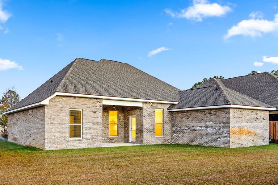 Exterior details and patio area of a home in Starburst at Hammock Bay, Freeport (Image 3).