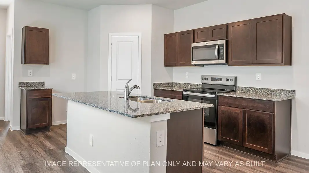 Furnished interior in a model home at Dove Crossing in Navasota (Image 6).