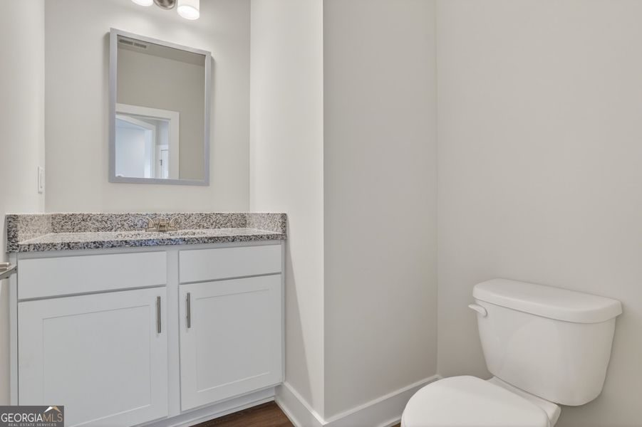 Furnished interior view inside a new home in The Fairways at Mirror Lake, Villa Rica (Image 35).