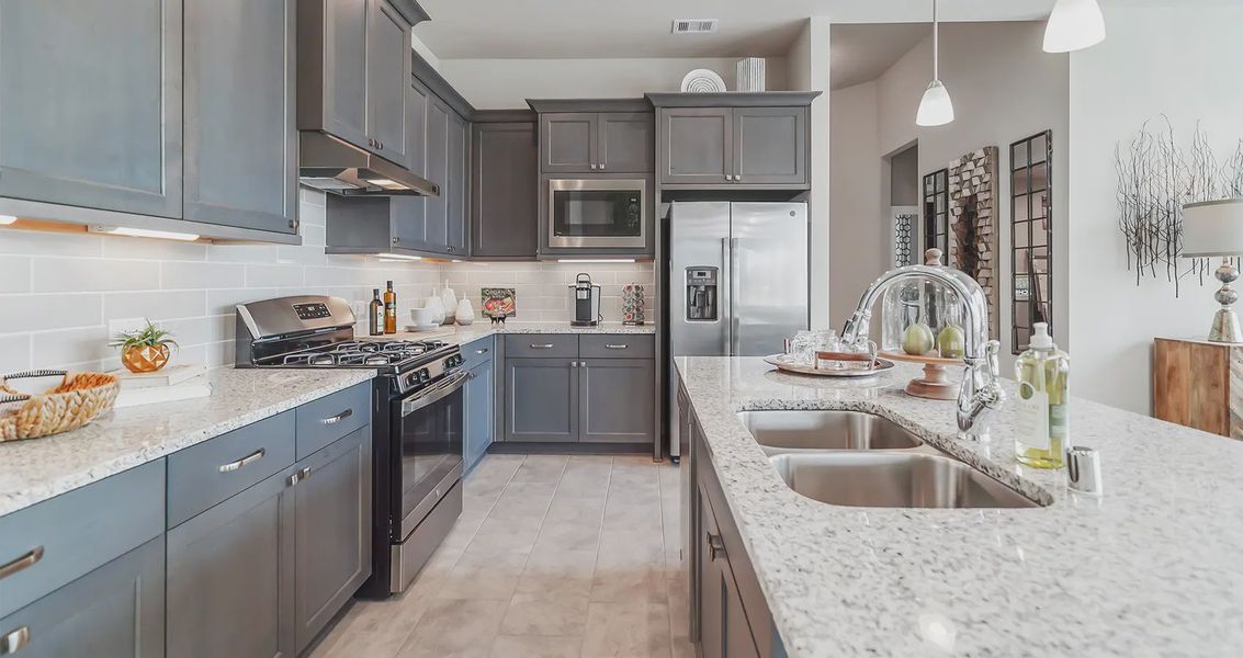 Representative furnished interior of a home built from the Orlando by Chesmar Homes in The Trails, New Caney (Image 8).