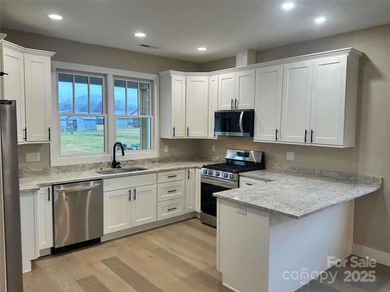 Furnished interior view inside a new home in , Hendersonville (Image 9).