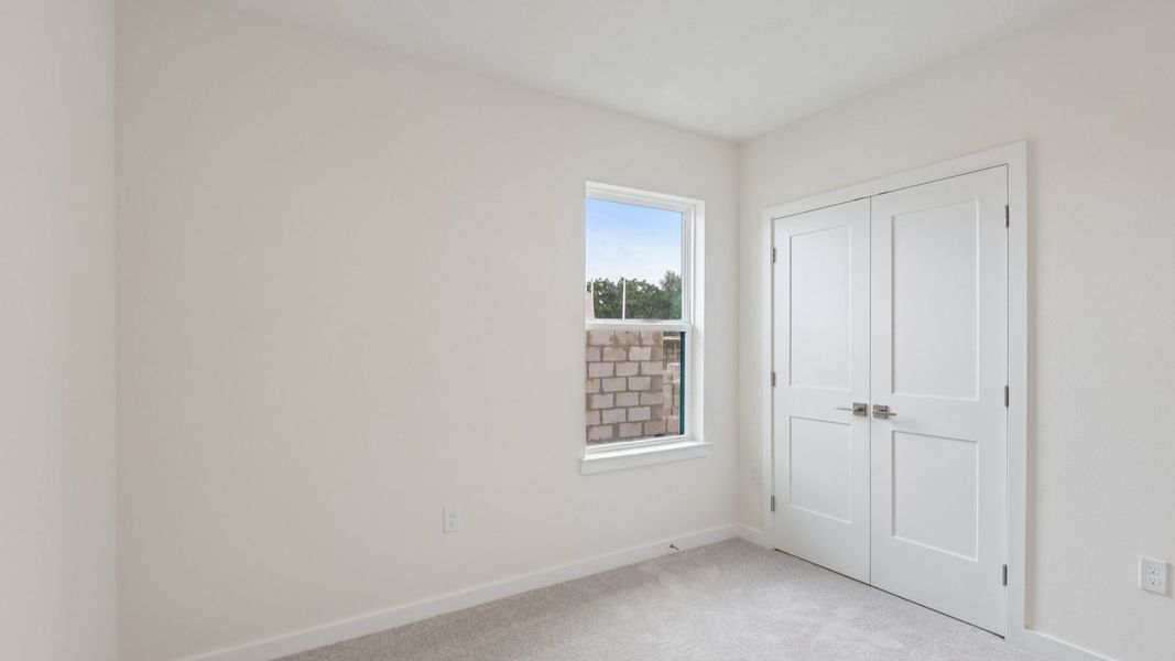 Furnished interior view inside a new home in Grasslands West, Lakeland (Image 34).