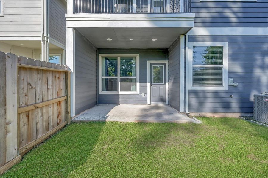 Exterior details and patio area of a home in The Woodland Hills 50', Willis (Image 3). Exterior details and patio area of a home in The Woodland Hills 50', Willis (Image 3).