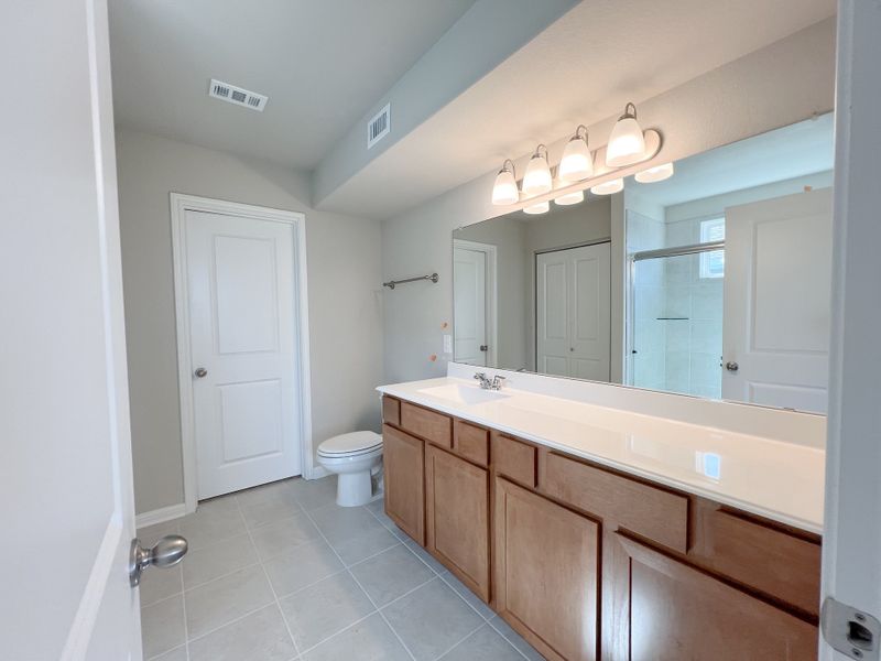 Representative furnished interior of a home built from the The Laura Belle Wallace II by Bigelow Homes in Creekside, Kyle (Image 9). Representative furnished interior of a home built from the The Laura Belle Wallace II by Bigelow Homes in Creekside, Kyle (Image 9).