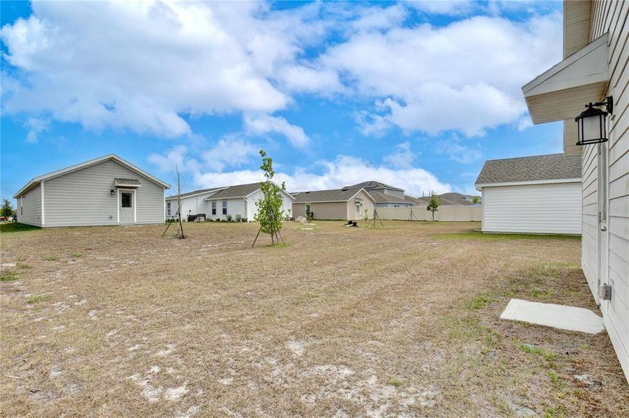 Exterior details and patio area of a home in Peace Creek Reserve, Winter Haven (Image 3).