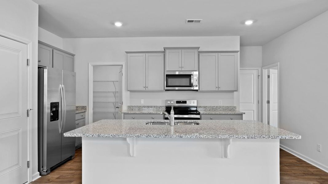 Representative furnished interior of a home built from the ROBIE by D.R. Horton in Hillcrest, Ravenel (Image 4).