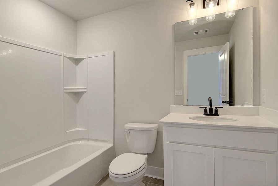 Furnished interior view inside a new home in Watson Hill, Summerville (Image 11).