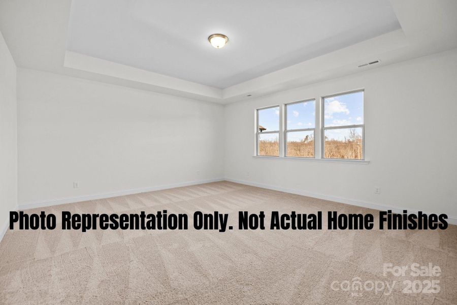 Primary Bedroom With Tray Ceiling