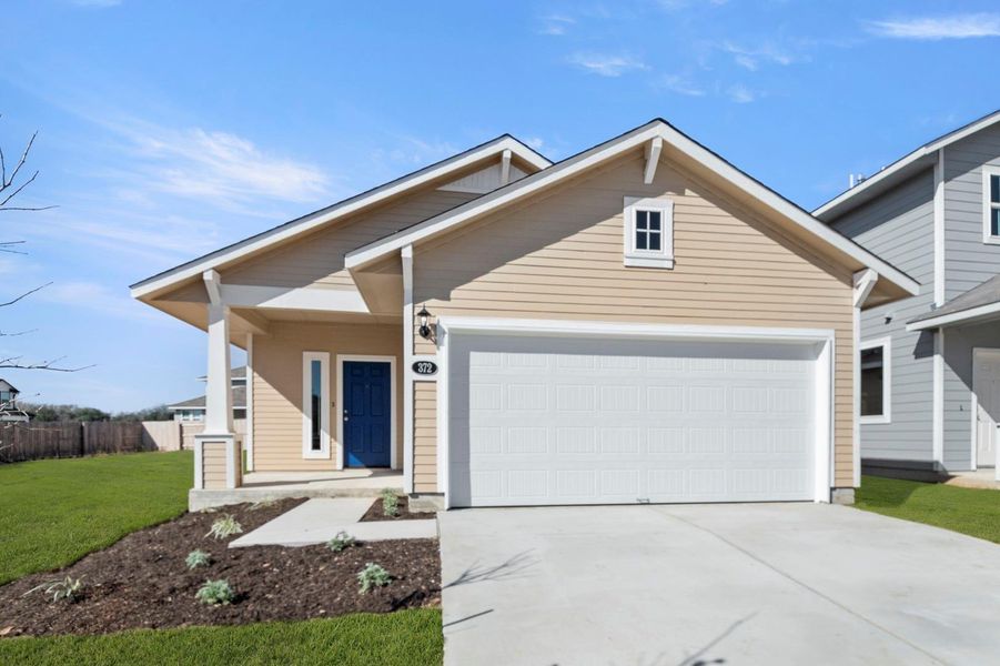 Front exterior of a new home in Hymeadow, Maxwell, TX, highlighting curb appeal (Image 1). Front exterior of a new home in Hymeadow, Maxwell, TX, highlighting curb appeal (Image 1).