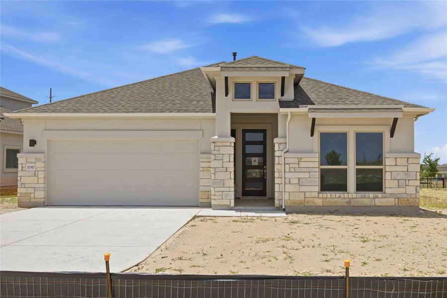 Front exterior of a new home in Preserve at Lakeside Meadows, Pflugerville, TX, highlighting curb appeal (Image 23).