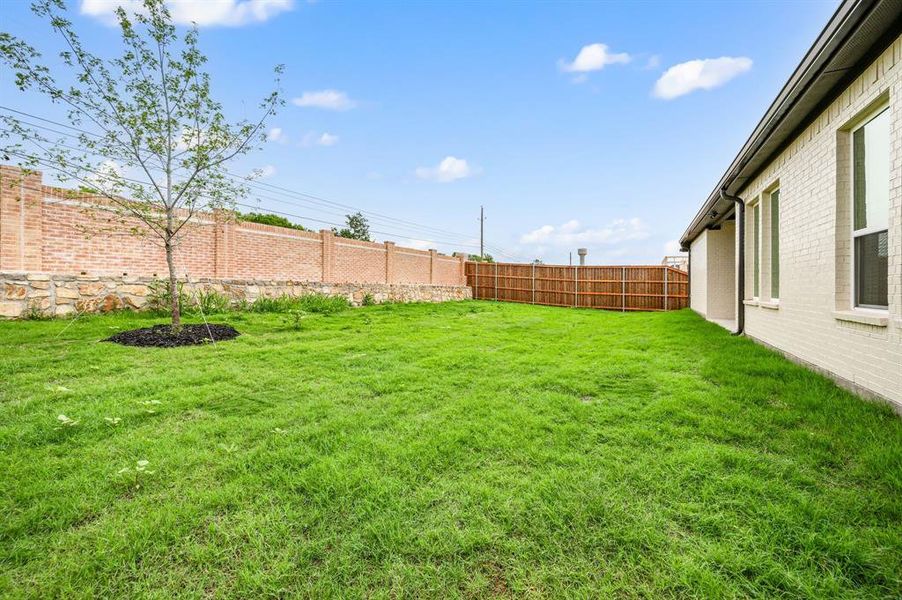 Front exterior of a new home in LeTara, Haslet, TX, highlighting curb appeal (Image 21).