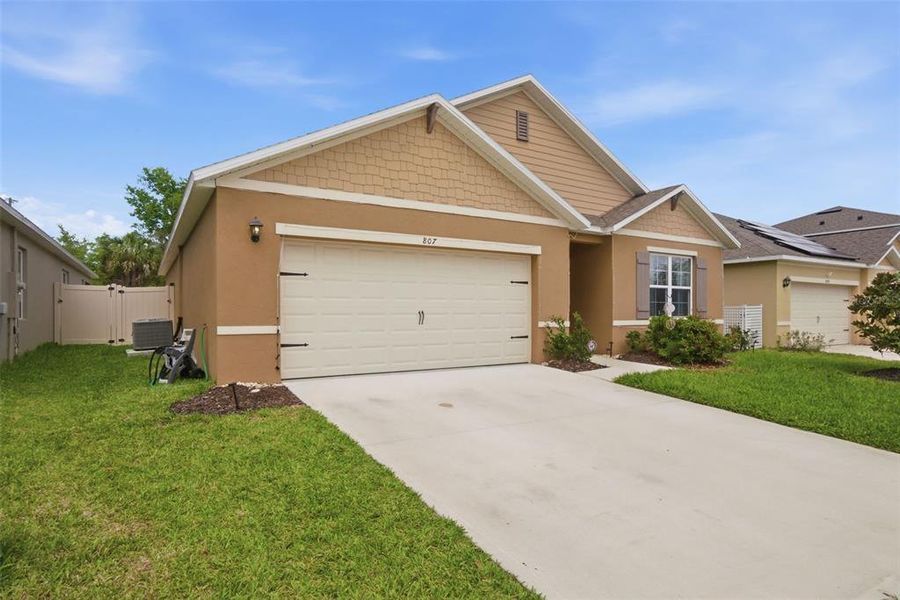 Front exterior of a new home in Cadence at Parc Hill, Orange City, FL, highlighting curb appeal (Image 21).