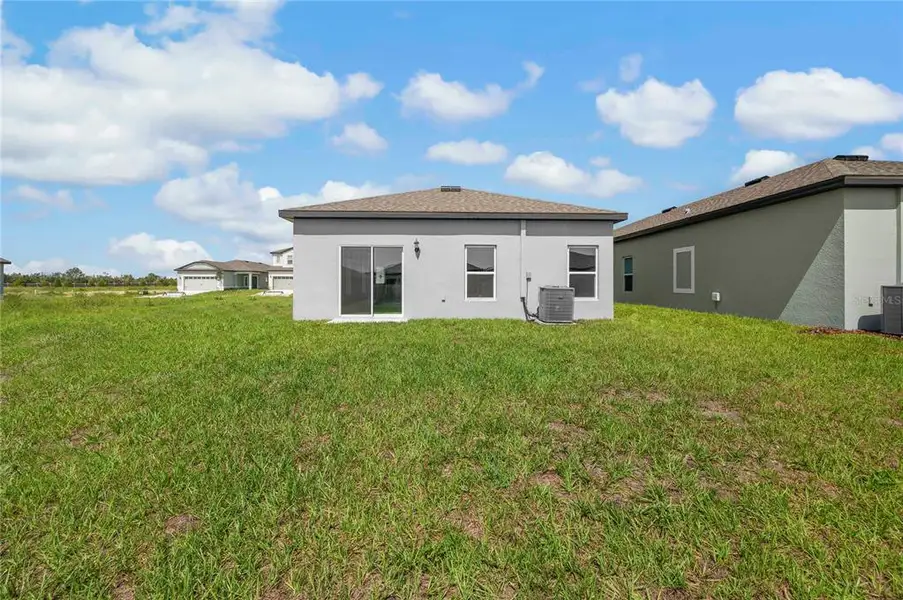 Exterior details and patio area of a home in Gum Lake Preserve, Lake Alfred (Image 3).