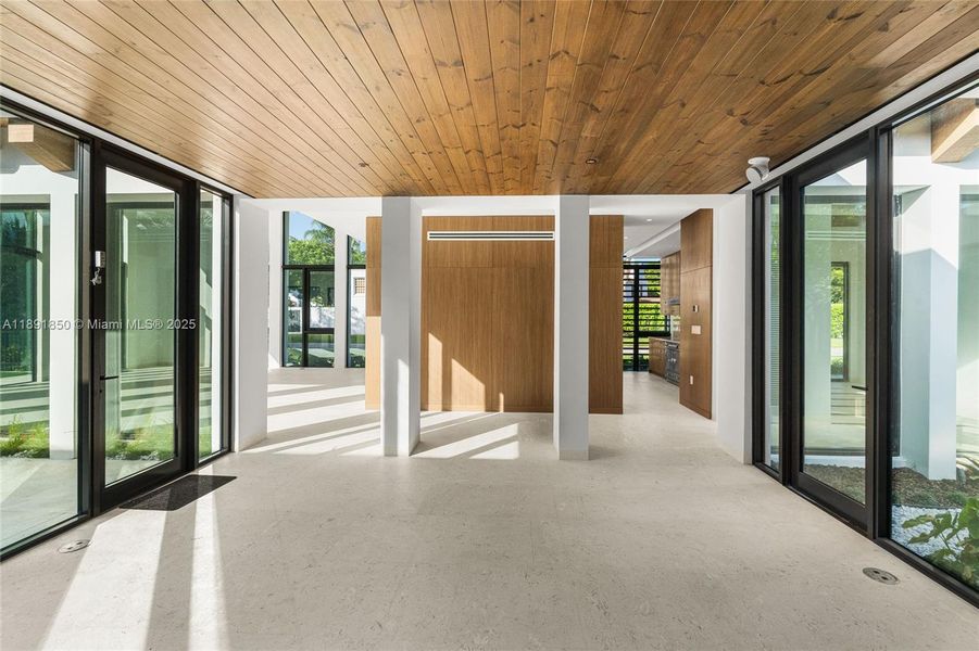 Exterior details and patio area of a home in , Coral Gables (Image 3).
