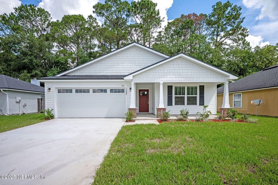 Front exterior of a new home in , Jacksonville, FL, highlighting curb appeal (Image 20).