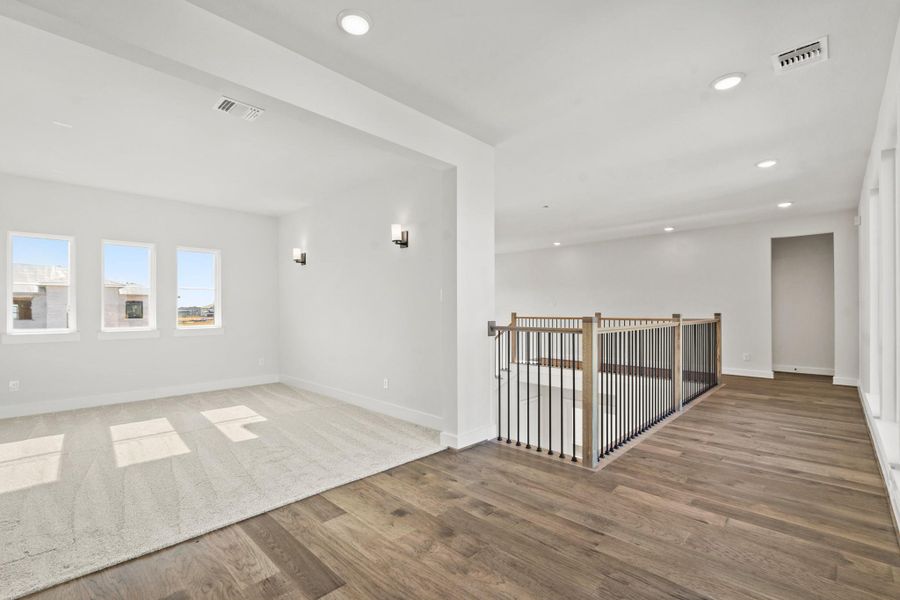 Spacious, unfurnished interior of a new home in Bridgeland, Cypress (Image 27). Spacious, unfurnished interior of a new home in Bridgeland, Cypress (Image 27).