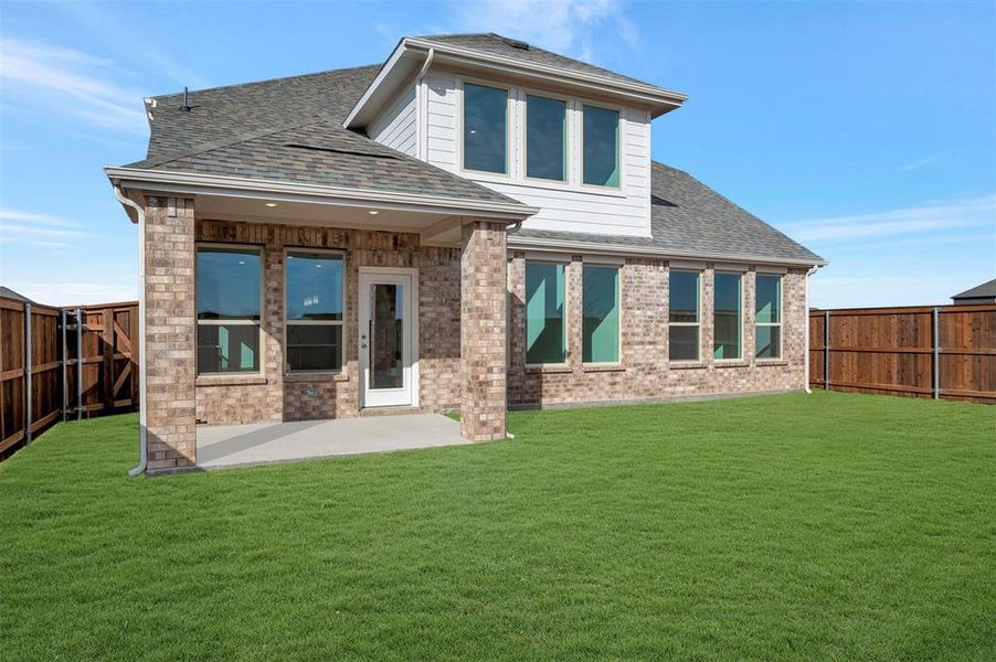 Exterior details and patio area of a home in Lily Creek at Sutton Fields, Aubrey (Image 21).