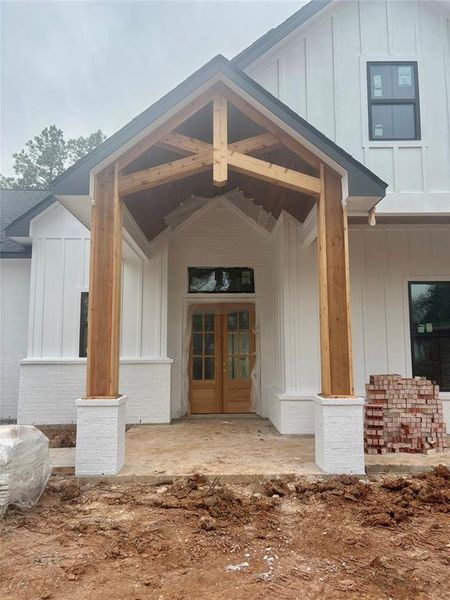 The front entry features stunning cedar accents with tounge & groove porch ceilings!