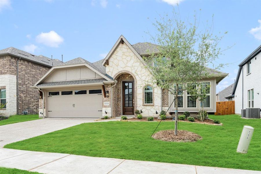 Front exterior of a new home in Legacy Ranch Classic 55, Melissa, TX, highlighting curb appeal (Image 24). Front exterior of a new home in Legacy Ranch Classic 55, Melissa, TX, highlighting curb appeal (Image 24).