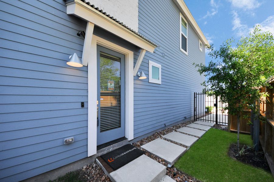 Front exterior of a new home in , Houston, TX, highlighting curb appeal (Image 1).