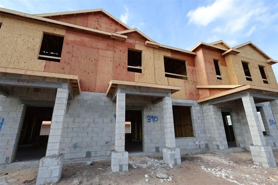 In-progress construction of a new home in Center Lake on the Park, St. Cloud, FL (Image 8).
