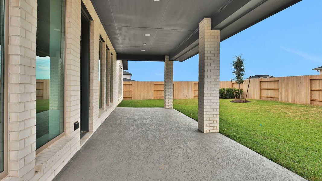 Exterior details and patio area of a home in Legacy Prairie at Katy Court, Katy (Image 3).