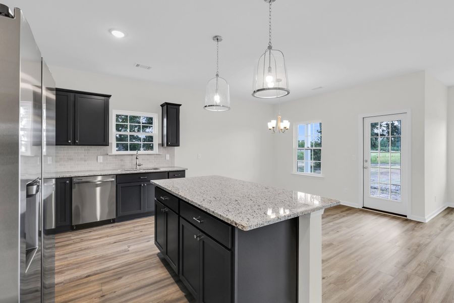 Representative furnished interior of a home built from the The Trask by RTS Homes in Tibet Road at Sassafras, Allenhurst (Image 4).