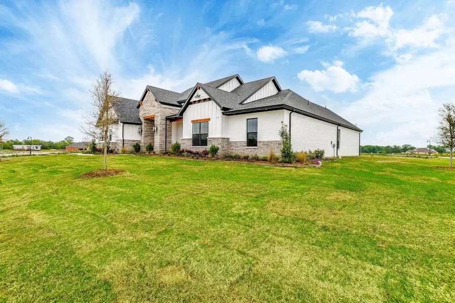 Representative exterior photo of a completed home built from the The Luke by Elmwood Custom Homes in Ranch at Stone Hill, Waxahachie, TX (Image 5).
