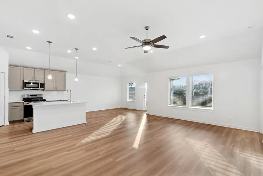 Spacious, unfurnished interior of a new home in Pinewood at Grand Texas, New Caney (Image 8).