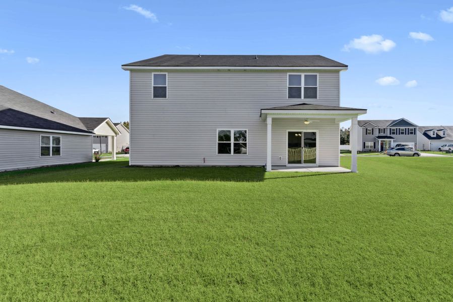 Exterior details and patio area of a home in Woodland Cove, Brunswick (Image 2). Exterior details and patio area of a home in Woodland Cove, Brunswick (Image 2).