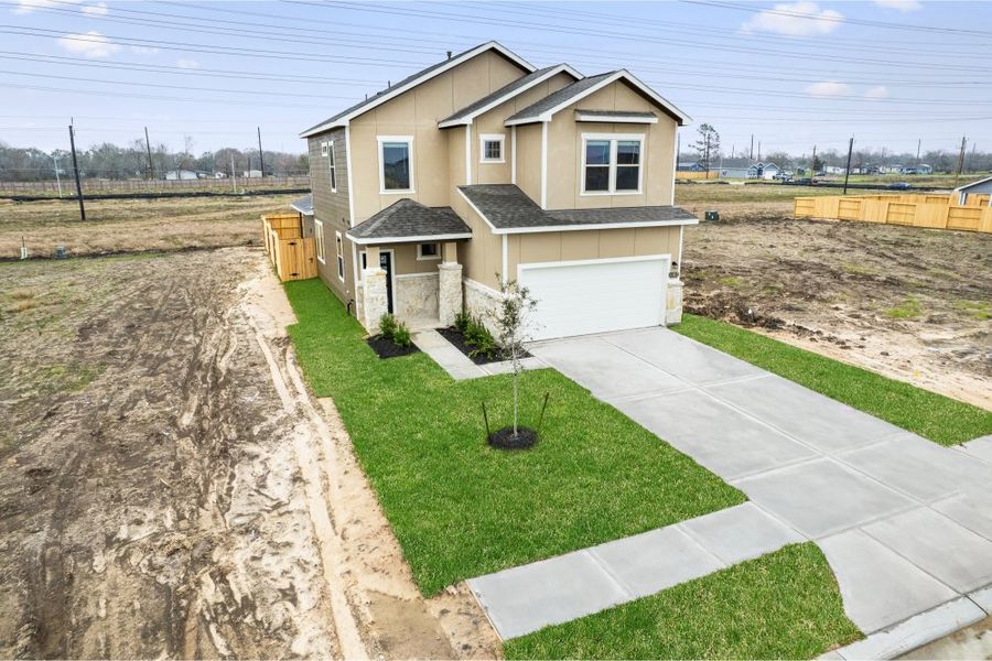 Front exterior of a new home in Glendale Lakes, Rosharon, TX, highlighting curb appeal (Image 29). Front exterior of a new home in Glendale Lakes, Rosharon, TX, highlighting curb appeal (Image 29).