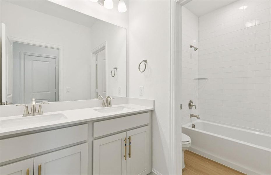 Spacious secondary bathroom with double vanity Spacious secondary bathroom with double vanity