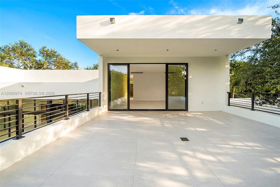 Exterior details and patio area of a home in , South Miami (Image 4).