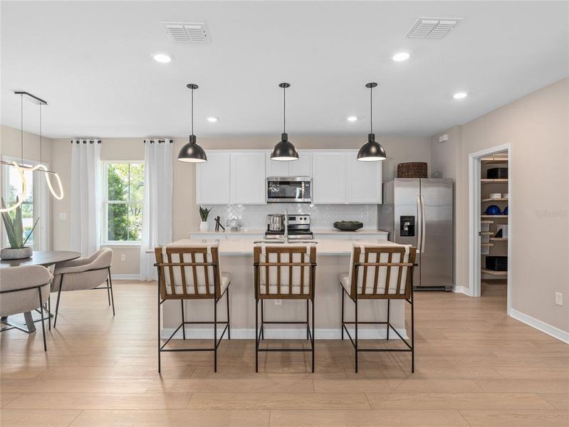Furnished interior view inside a new home in EverBe, Orlando (Image 8).